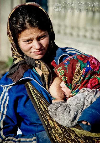 poor gypsy mother with child