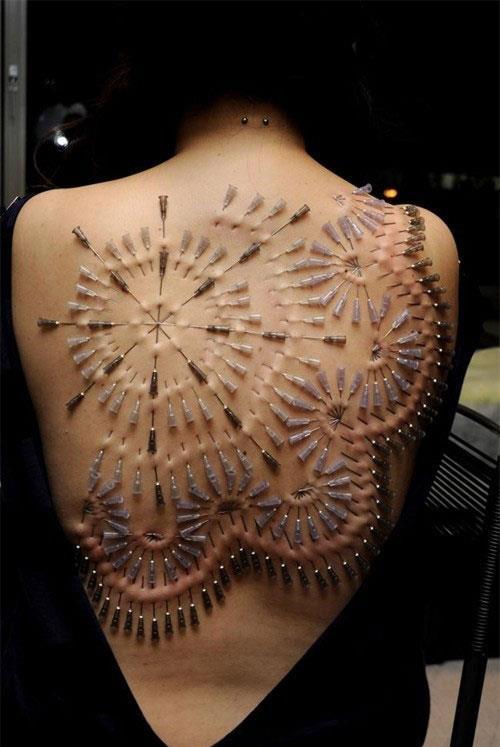 weird needle body art