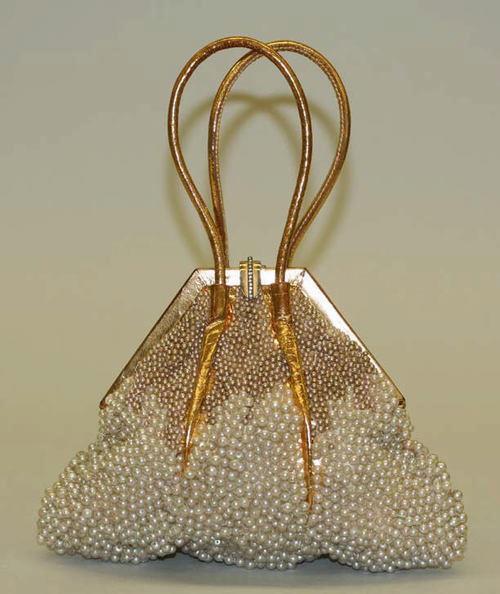 Photo: Gold leather and pearl bead evening bag ~ Marshall Field & Co ~ 1933