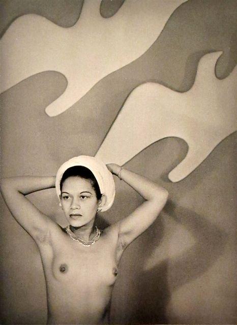 Man Ray - Ady Findelin in front of Giacometti’s Albatross, 1937.