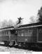 stock-photo-man-leaping-across-the-roof-of-railroad-cars-92578351
