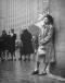 1945 girl singing in the street